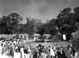 Local people at an open-air market in India during WWII.