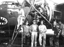 #444 at engine change, Yangkai, China, July 1944  Hammett, Basil Turko, Aspinwall, Bert, unk., and Burns  From the collection of Frank Bates.