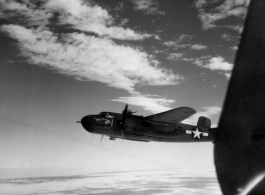 Nicknamed "Joyce Marie", Johnny Burns' B-25 H (441) flying from Yangkai, 1944.