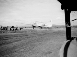 C-46 transport plane in China, likely at Luliang. Possibly serial #347341. During WWII. 