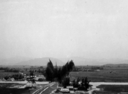 An aerial photograph of a bridge being bombed by the 491st Bomb Squadron in Yunnan or Indochina, during WWII.