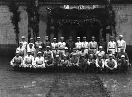 Chinese soldiers pose for group shot during rally.