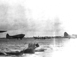 American C-46s and P-38s at a base in the CBI.