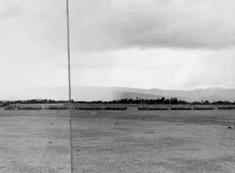 Panorama of Chinese soldiers in numerous ranks during exercises in southern China, probably Yunnan province, or possibly in Burma.