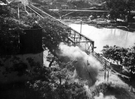 Bombing on Phu Lang Thuong railway bridge over the Thuong River at Bắc Giang City in French Indochina (Vietnam), during WWII. In northern Vietnam, and along a critical rail route used by the Japanese.  Coordinates:  21°16'32.69"N 106°11'9.28"E  This photo shows the truly extraordinarily low levels the bombing B-25s sometimes flew at times during missions.