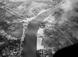 Bombing of Đò Lèn Bridge in Hà Trung Town in French Indochina (Vietnam), during WWII. In northern Vietnam, and along a critical rail route used by the Japanese.