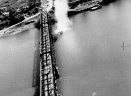 Bombing of Đò Lèn Bridge in Hà Trung Town in French Indochina (Vietnam), during WWII. In northern Vietnam, and along a critical rail route used by the Japanese.