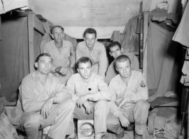 Engineers of the 797th Engineer Forestry Company pose in their barracks in Burma.  During WWII.