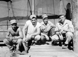 Engineers of the 797th Engineer Forestry Company pose outside tent in Burma.  During WWII.