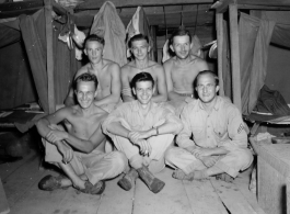 Engineers of the 797th Engineer Forestry Company pose in their barracks in Burma.  During WWII.