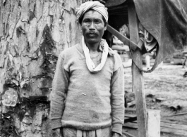 Local people in Burma near the 797th Engineer Forestry Company: A local man, hired to work at the lumber mill.  During WWII.