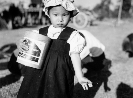 Local people in Burma near the 797th Engineer Forestry Company--a small child.  During WWII.