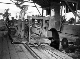 Operations of a mill of the 797th Engineer Forestry Company in Burma.  During WWII.