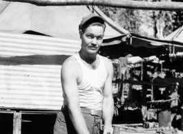 Engineer of the 797th Engineer Forestry Company in Burma, repairing skidding tongs.  During WWII.