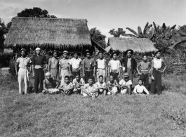 Local people in Burma near the 797th Engineer Forestry Company--A group of men pose in Burma.  During WWII.