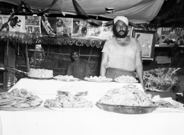 Men vending food in Burma or India.  Near the 797th Engineer Forestry Company.  During WWII.