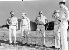 Newly-minted Medal of Valor recipients in India, 1945.  The officer in the picture on the left is First Lieutenant Donald J. Lochner, followed by Second Lieutenant Harold N. Olive, and finally Harry J. Hartz, all 24th Combat Mapping Squadron. The two men to the right are unknown.
