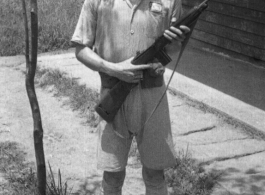 A Chinese soldier poses with an American carbine rifle in northern China during WWII.