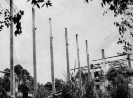 Bob Riese and friend explore remains of aircraft factory and hangers at the air base at Liuzhou, in 1945. The facilities at the base were first destroyed by the Chinese and Americans during retreat in the face of Ichigo during the fall of 1944, then may have been destroyed more by American bombardment during Japanese occupation, and possibly destroyed more by the Japanese as they retreated the area in 1945.