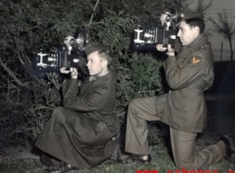 American GIs take pictures with oversized cameras in the CBI during WWII. From the collection of Hal Geer.