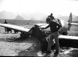 An American P-40 down in Guilin, China, during WWII.  From the collection of Hal Geer.