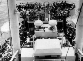 GIs on ship on the way back to the US after the war. The ship is probably the SS Marine Raven.