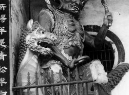 Door guards at a Buddhist temple in China, during WWII.