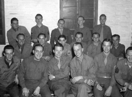 Festive GIs pose in a group in the CBI during WWII. Kenneth Williams is second from right in front row. 