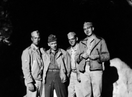 American GIs pose in a cave entrance in SW China during WWII.