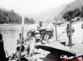 Chinese and American troops on a river in Yunnan province, China, during WWII.