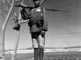 A Chinese soldier keeping guard at an American base, somewhere in China.