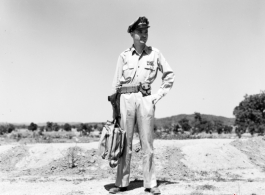 An American soldier with a handbag in the CBI.  From the collection of Wozniak, combat photographer for the 491st Bomb Squadron, in the CBI.