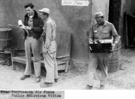 Fourteenth Air Force Transport Section radio operators outside their palatial Static Plaza, or in plain words, radio shack.