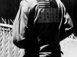 Robert Frederick Riese, shown here with flight jacket and 'blood chit' in China.