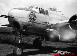 The B-25H  "Wabash Cannonball" with 'practice' bombs laying beneath the bomb bay. With no mission symbols or residue from the side-mounted machine guns on fuselage side this photo must have been taken soon after the aircraft was assigned to the 491st Bm Sq at  Yangkai AB, China, in the spring of 1944.