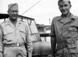 American officers stand in front of jeep in India during WWII.    From the collection of David Firman, 61st Air Service Group.