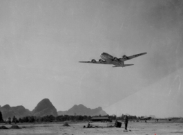 Photos taken by Robert F. Riese in or around Liuzhou city, Guangxi province, China, in 1945.  C-54 over the runway at Liuzhou during WWII.