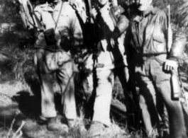 Intrepid GIs out exploring (or maybe even hunting) with their carbines among the pines near Yangkai. During WWII.