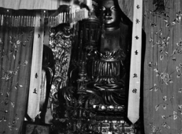 Inside a Buddhist temple in China. During WWII.