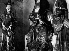 Statues inside a Buddhist temple in Yunnan, China. During WWII.