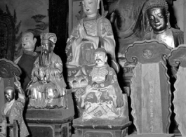 Figures inside a Buddhist temple in China.