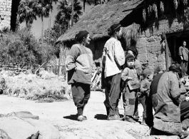 Local people in a village in China, probably Yangkai village, Yunnan province.