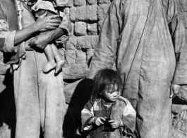 People in a village in China during WWII.