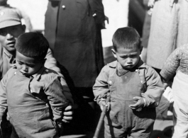 Nationalist soldier and kids in Yunnan during WWII.