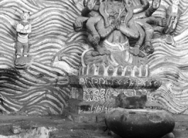 Figure in a Buddhist temple in Yunnan province, China, during WWII.