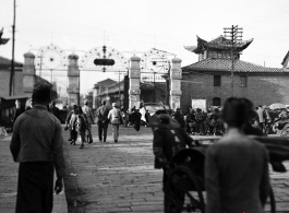 Street scene in Kunming city, Yunnan province, China, during WWII.