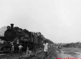 Chinese civilian evacuation in Guangxi province, China, during WWII, during the summer or fall of 1944 as the Japanese swept through as part of the large Ichigo push.