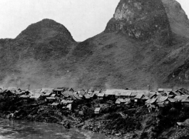 The town of Chin Chen Chiang with the straw huts. When the Japanese captured this city they burned these houses, causing one of the largest fires ever seen in China.