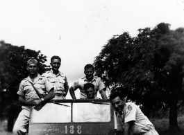 A jeep with American GIs in the CBI during WWII.  "The Stillwell Road, shortcut to Tokyo"