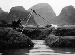 Pumping water into the fields in Guangxi province, either Liuzhou or Guilin.  Selig Seidler was a member of the 16th Combat Camera Unit in the CBI during WWII.